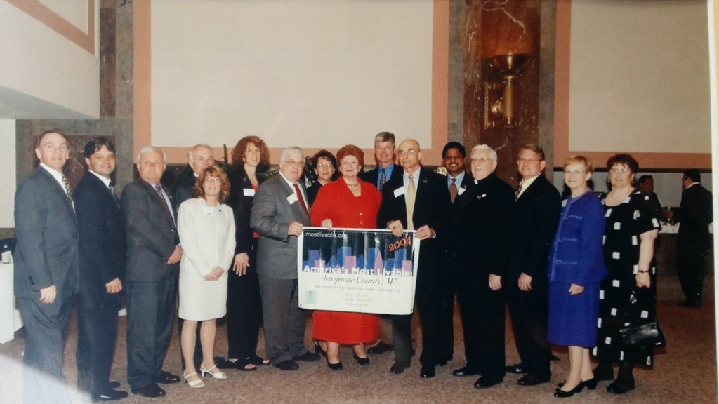 In this 2004 photo, a group of Marquette County community leaders are shown at the Partners for Livable Communities’ awards reception at the U.S. Senate’s Russell Building in Washington, D.C. From left, are unknown, Bill Nordeen, Bob Raica, Bill Rigby, unknown, Bonnie Bradley, Jerry Irby, Karen Anderson, U.S. Sen. Debbie Stabenow, U.S. Rep. Bart Stupak, Stu Bradley, unknown, Monsignor Louis Cappo, Jerry Peterson, Sue Rigby and Doreen Takalo. (Photo courtesy of Stu Bradley)